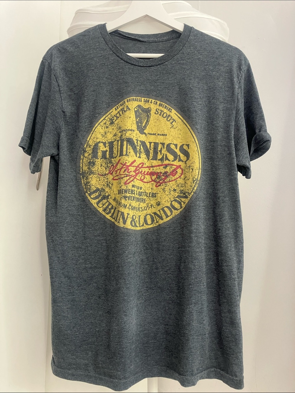 Guinness Dark Heather Gray Short Sleeve Tee with Yellow Crest Graphic